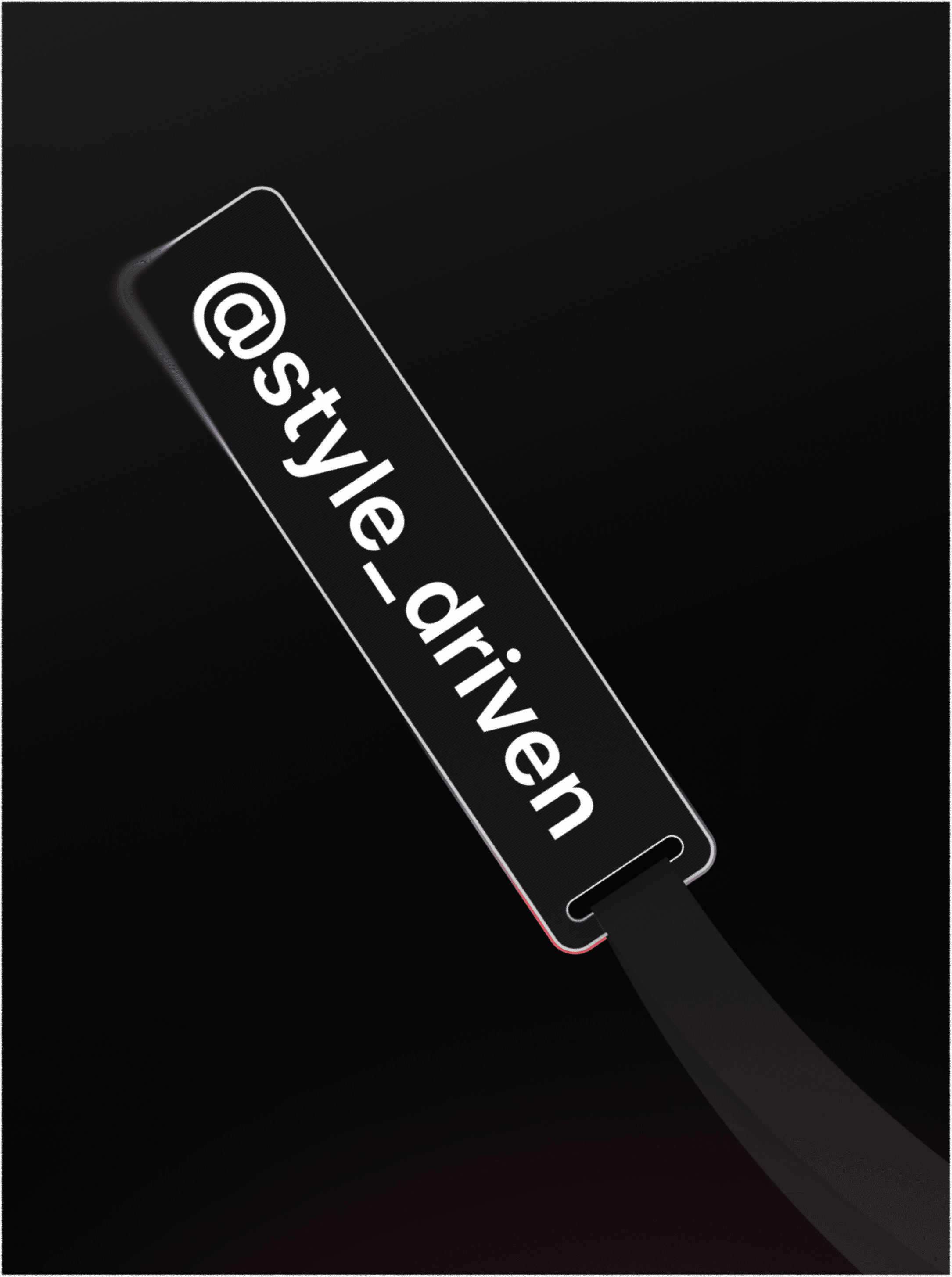 Vertical black tag on a strap, set against a dark backdrop and printed with the handle "@style_driven"