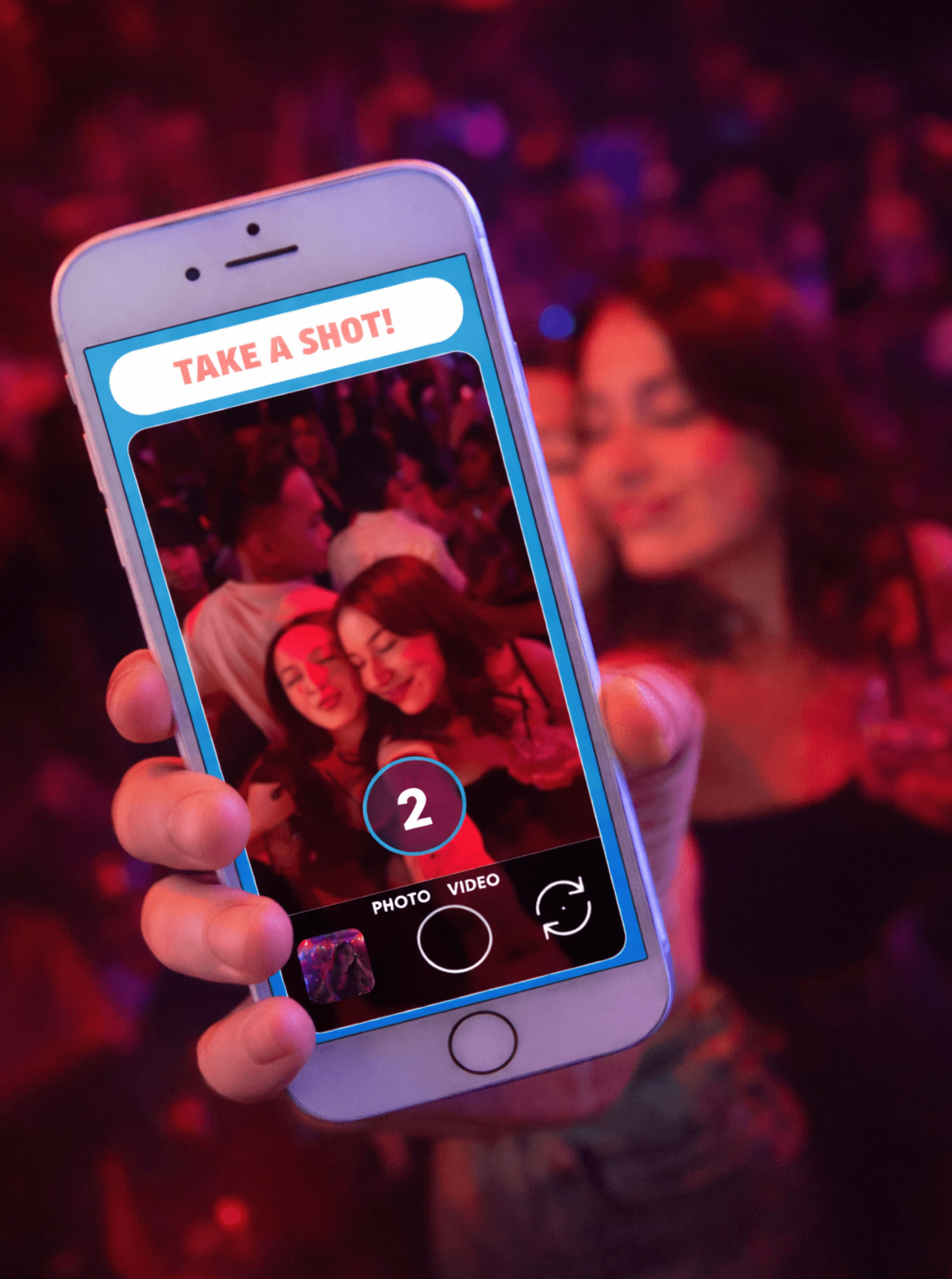 Hand holding a phone at a red-lit party, the Take a Shot camera screen counting down over two posing guests